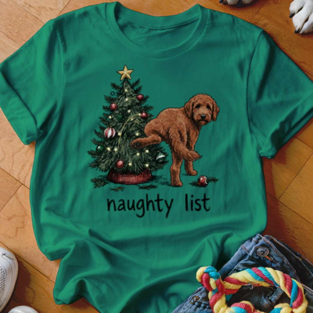 Brown dog marking a Christmas tree with "naughty list" text below.