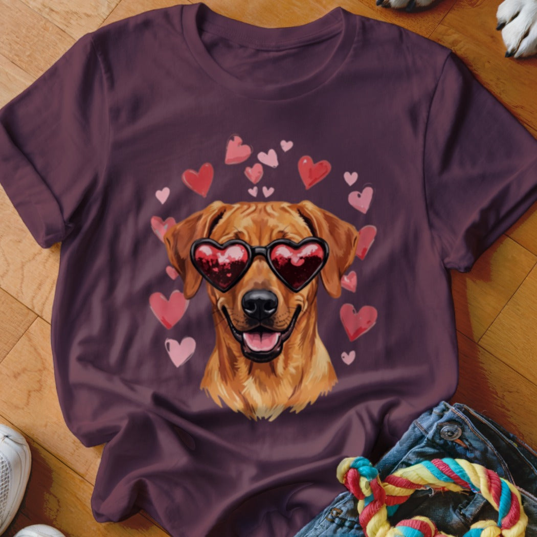 Maroon crewneck t-shirt featuring a golden retriever wearing heart-shaped sunglasses surrounded by pink hearts.