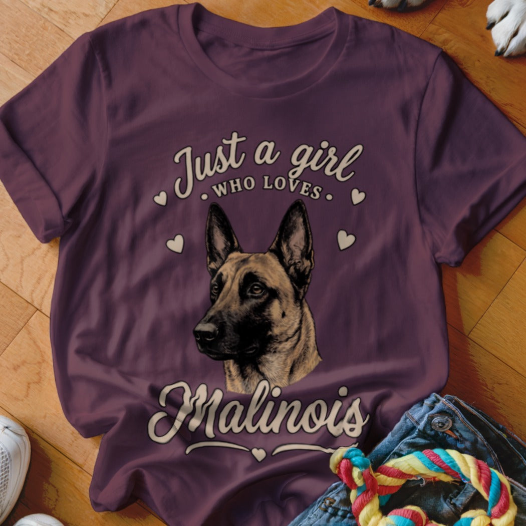 Plum-colored t-shirt with a Belgian Malinois illustration and text that reads "Just a girl who loves Malinois."