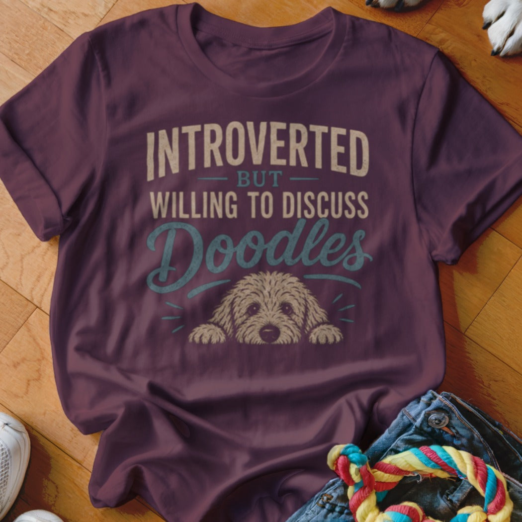 Maroon t-shirt with text "INTROVERTED BUT WILLING TO DISCUSS Doodles" and a doodle dog graphic.