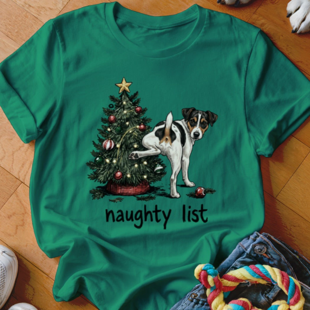 Green t-shirt with a dog next to a Christmas tree, reads "naughty list."