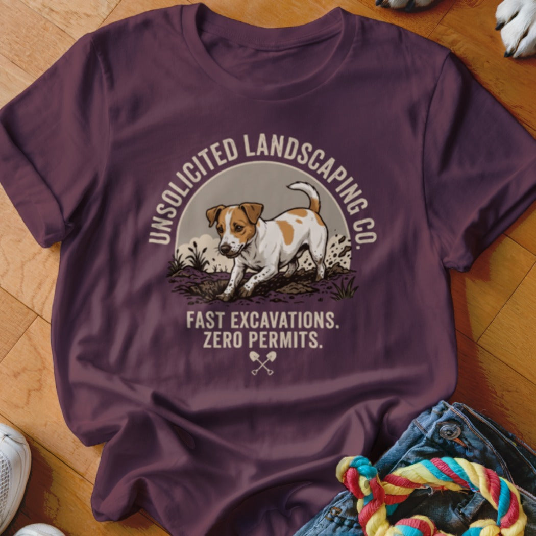 T-shirt with dog digging, "Unsolicited Landscaping Co." and "Fast Excavations. Zero Permits." text.