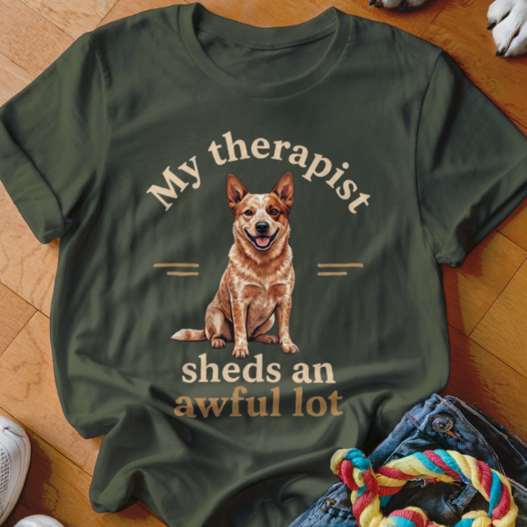 Green t-shirt with a red heeler dog and text "My therapist sheds an awful lot".