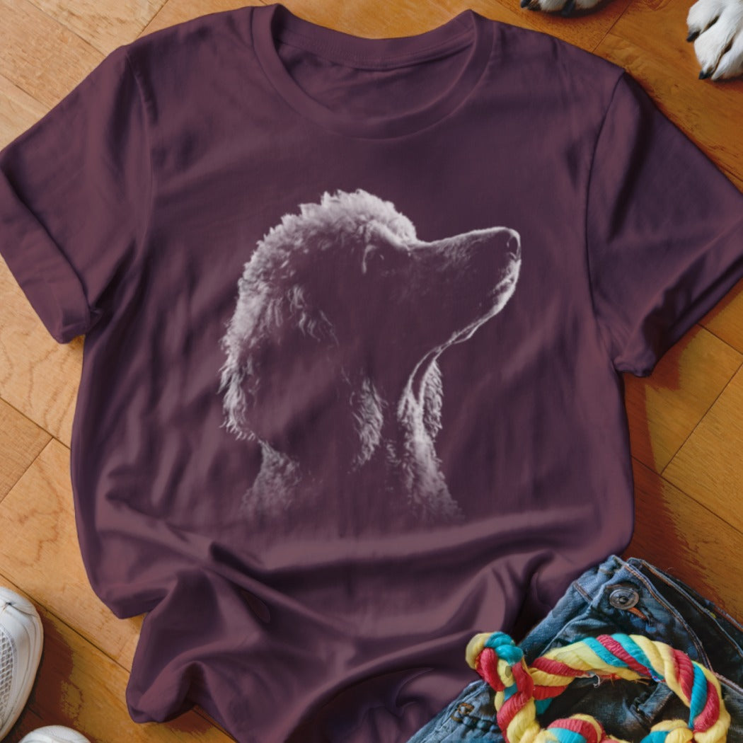 Dark plum t-shirt with white outline graphic of a poodle looking upwards