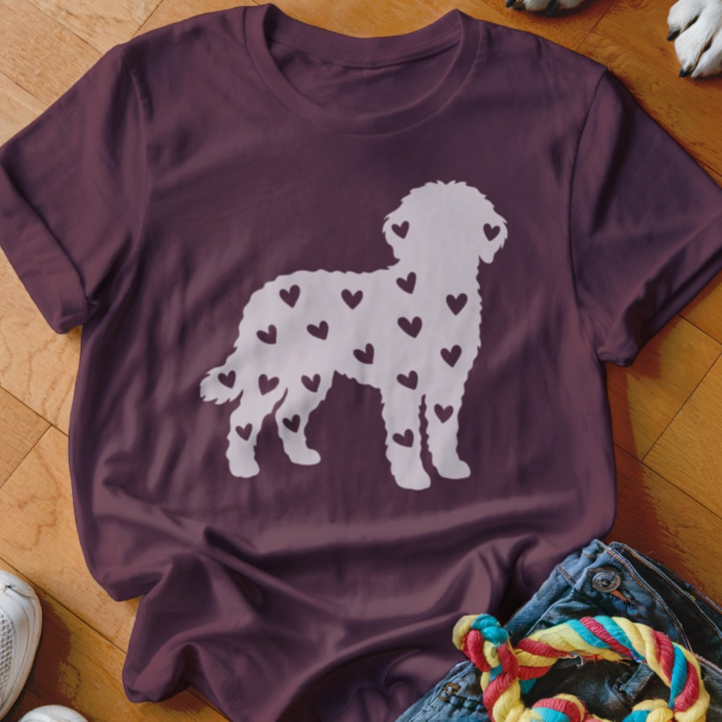 Maroon t-shirt with white doodle dog silhouette filled with small hearts.