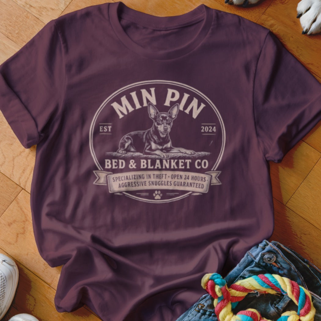 Maroon t-shirt with "Min Pin Bed & Blanket Co" graphic featuring a dog.