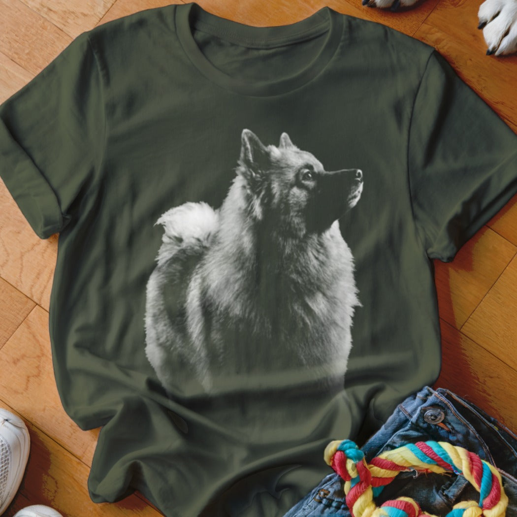 T-shirt with a black and white graphic of a fluffy dog looking up.