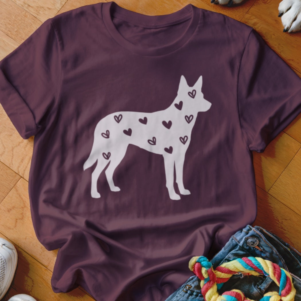Maroon t-shirt with a white dog silhouette filled with small hearts.