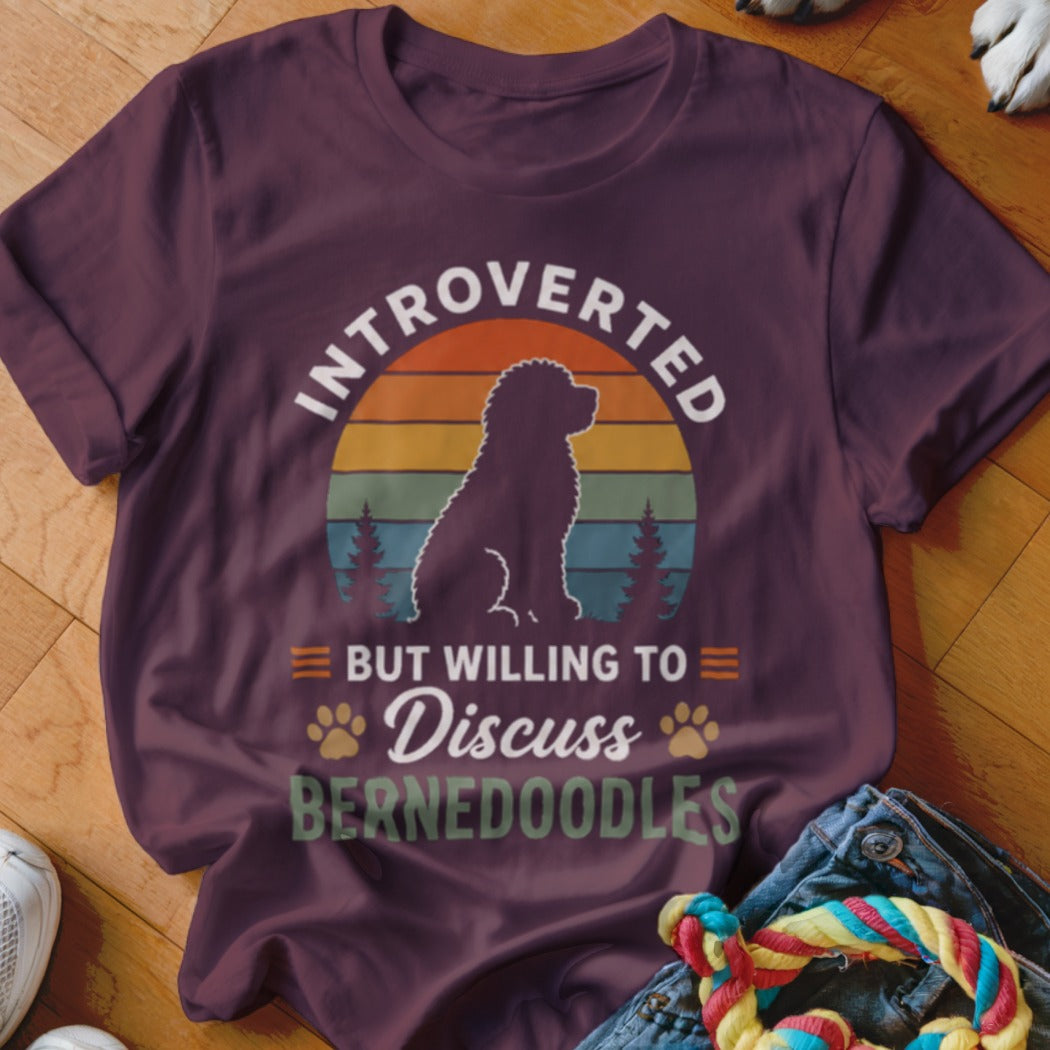 Maroon t-shirt with "Introverted but willing to discuss Bernedoodles" text and dog silhouette.