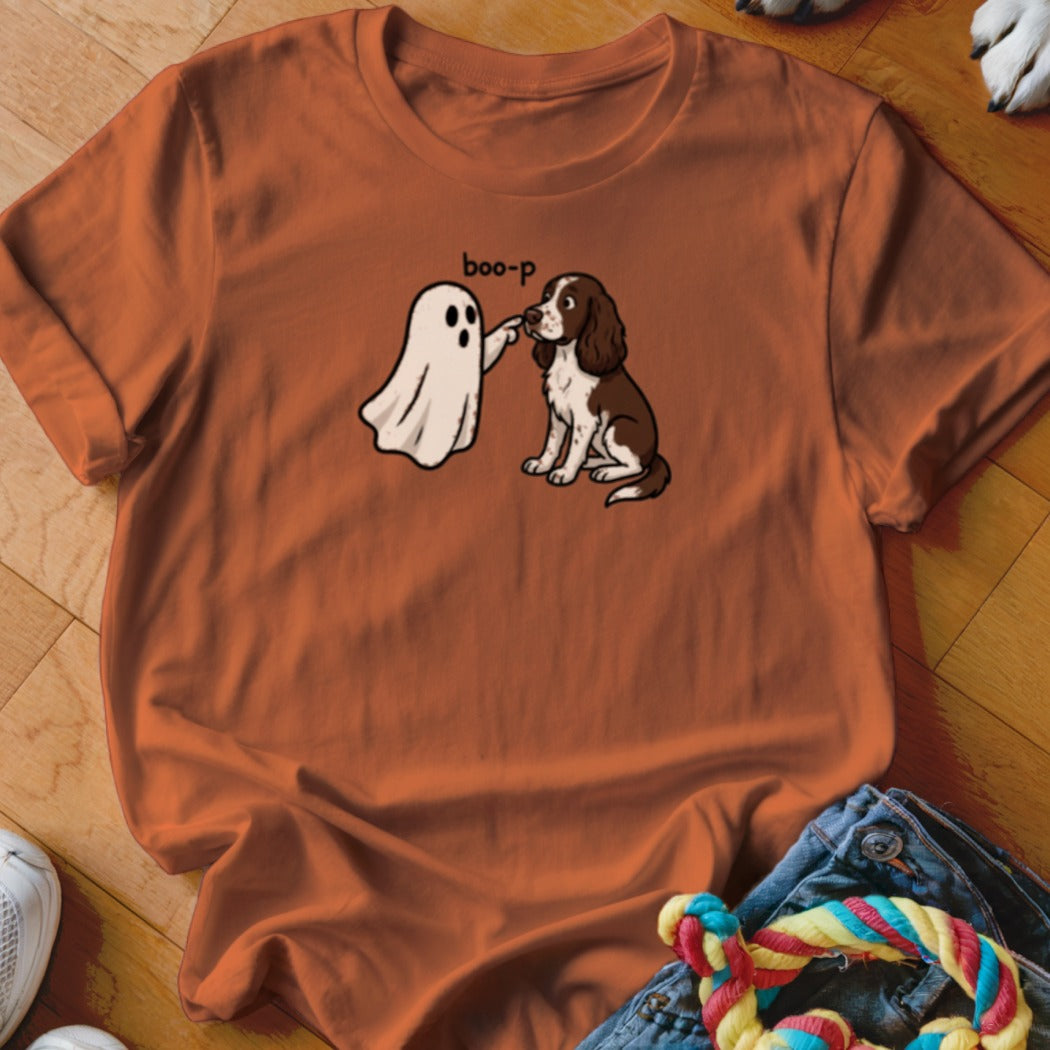 Cartoon ghost booping a sitting brown and white dog with text "boo-p".