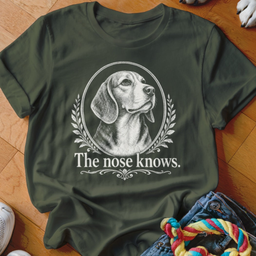 Beagle portrait in a laurel wreath with text "The nose knows."