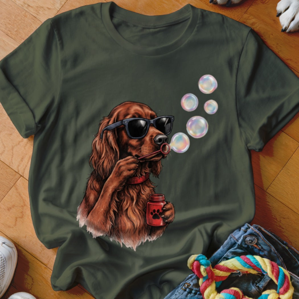Dark green t-shirt featuring an Irish Setter wearing sunglasses and blowing soap bubbles.