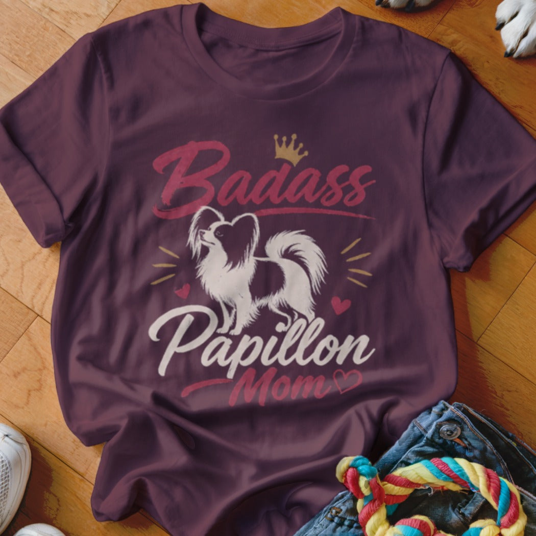 Maroon t-shirt with "Badass Papillon Mom" text and a Papillon dog illustration.