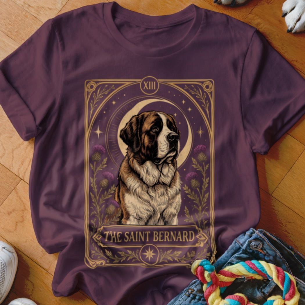 Plum-colored t-shirt featuring a tarot card graphic of a Saint Bernard dog with the text THE SAINT BERNARD.