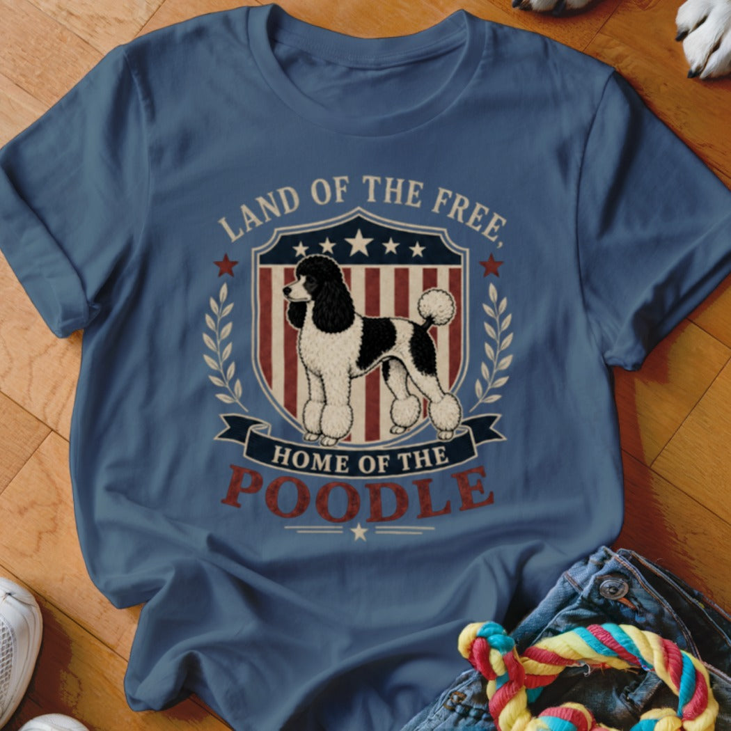 Blue t-shirt with poodle in shield reading "Land of the Free, Home of the Poodle".