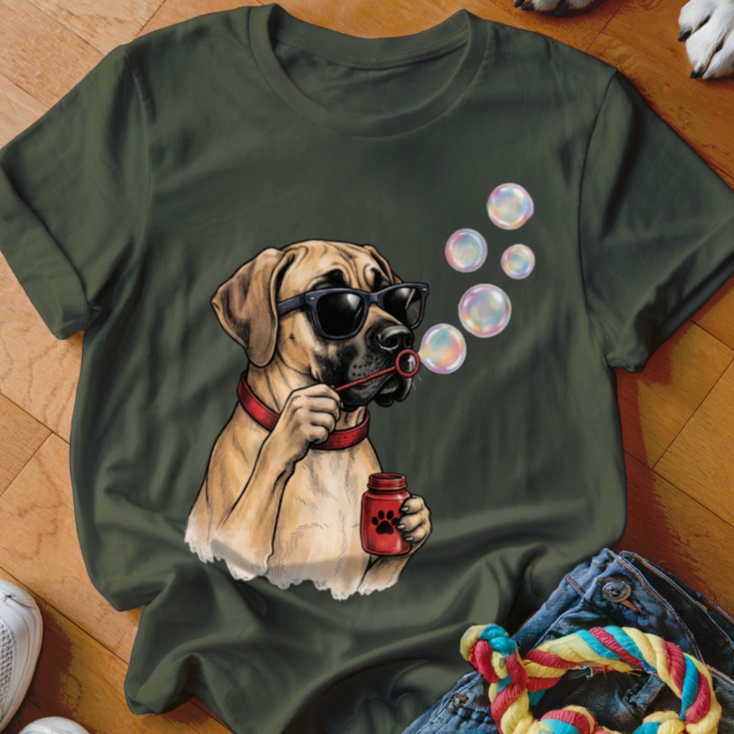 Dark green t-shirt featuring a graphic of a dog wearing sunglasses and blowing soap bubbles.