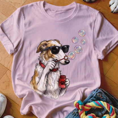 Light pink t-shirt featuring a graphic of a dog wearing sunglasses and blowing soap bubbles.