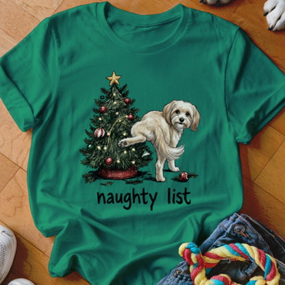 T-shirt graphic of a dog by a Christmas tree with text "naughty list".