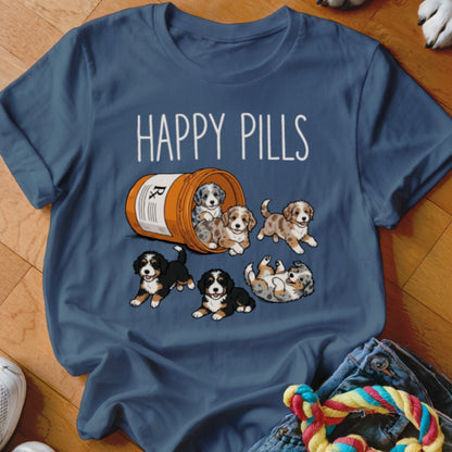 T-shirt with "Happy Pills" text and cartoon puppies spilling from a prescription bottle.