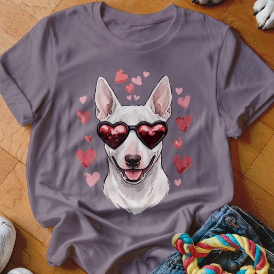 Gray crewneck t-shirt featuring a graphic of a white bull terrier wearing heart-shaped sunglasses surrounded by pink hearts.