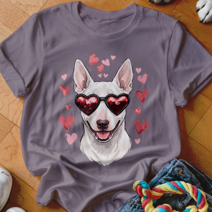 Gray crewneck t-shirt featuring a graphic of a white bull terrier wearing heart-shaped sunglasses surrounded by pink hearts.