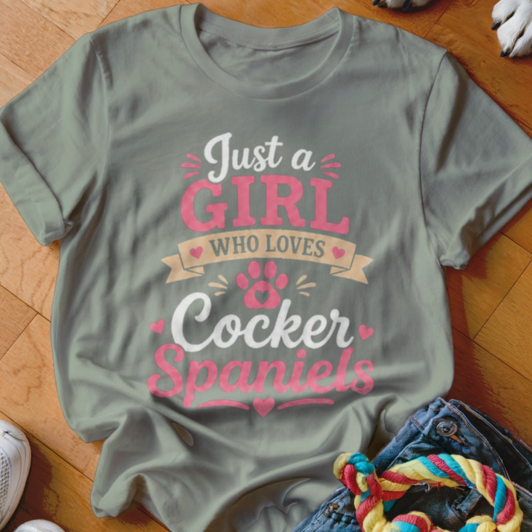 Grey t-shirt with text "Just a Girl Who Loves Cocker Spaniels" and paw print.
