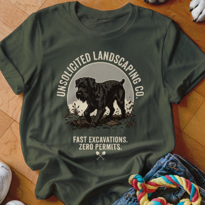 Green t-shirt with graphic of black dog and text: Unsolicited Landscaping Co. Fast Excavations. Zero Permits.