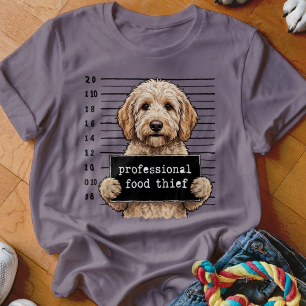 Dog mugshot with "professional food thief" sign and height markers.