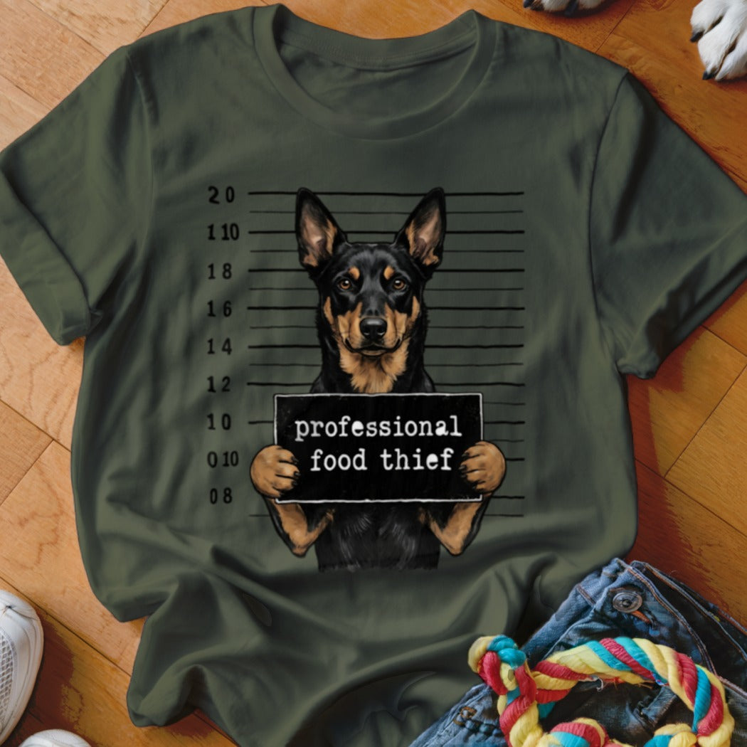 Dog mugshot shirt with "professional food thief" text.