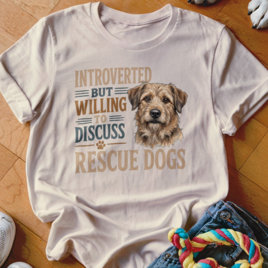 Cream t-shirt with illustration of a terrier and text "Introverted but willing to discuss rescue dogs".
