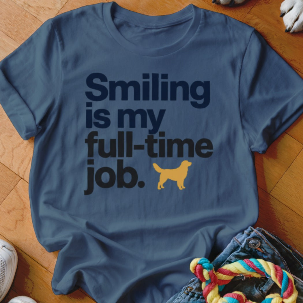 Navy t-shirt with text "Smiling is my full-time job." and a golden dog silhouette.