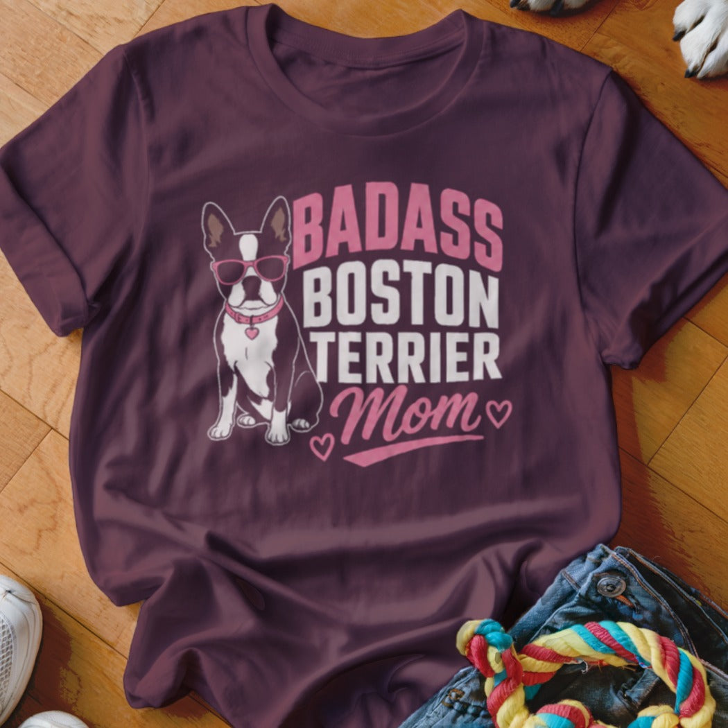 Boston Terrier Mom graphic on a maroon t-shirt with sunglasses and pink hearts.