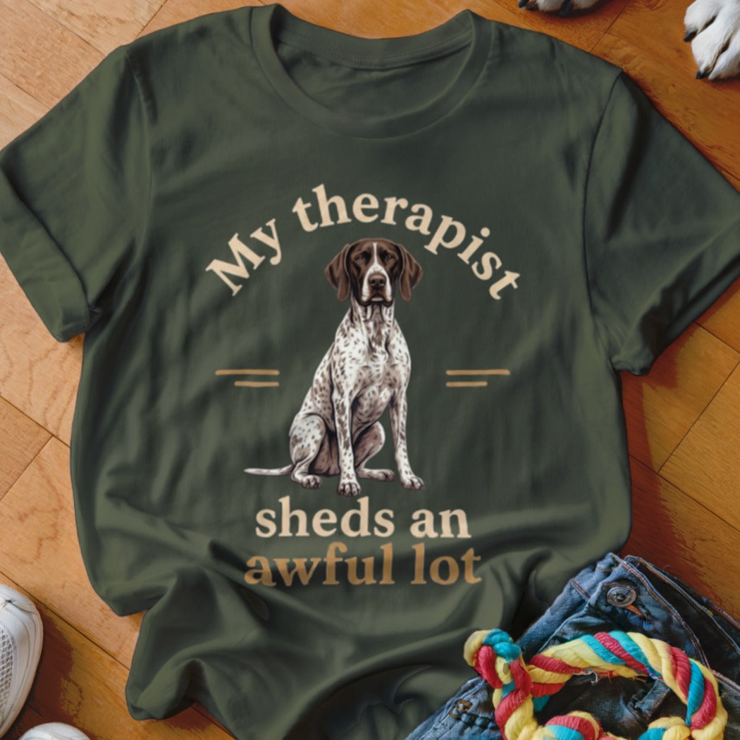 German Shorthaired Pointer on dark green t-shirt with text "My therapist sheds an awful lot."