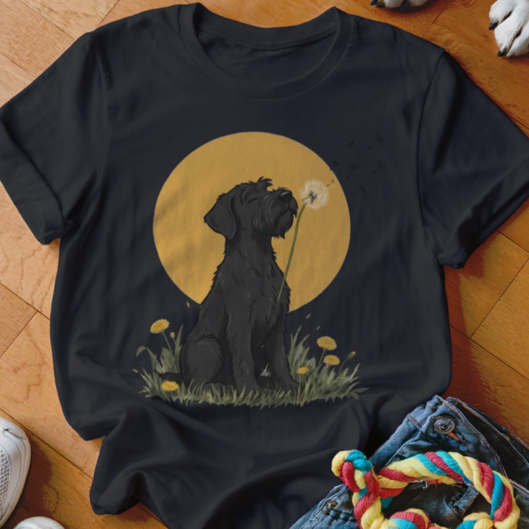 Black crewneck t-shirt featuring a graphic of a black dog blowing a dandelion against a yellow moon.