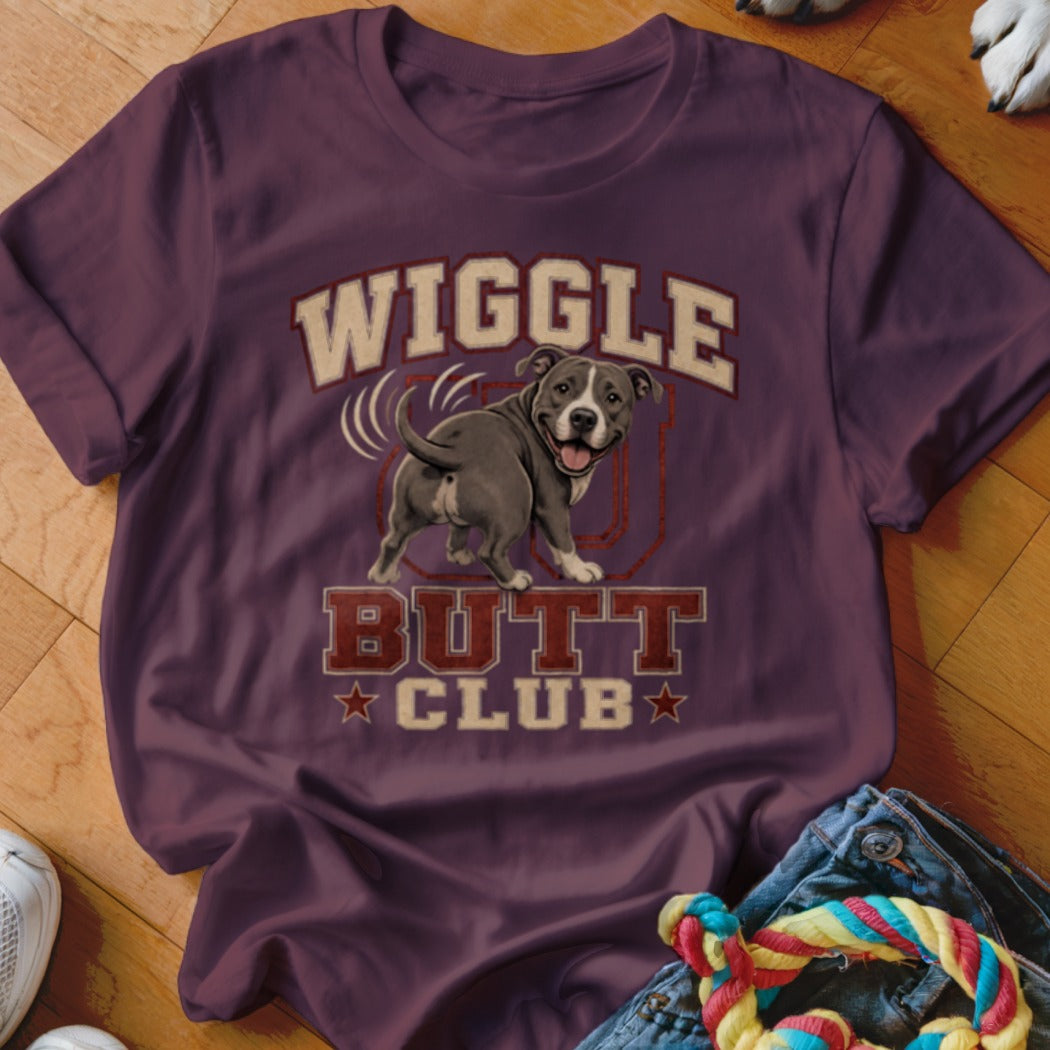 T-shirt with graphic of a happy pitbull dog and text "WIGGLE BUTT CLUB".