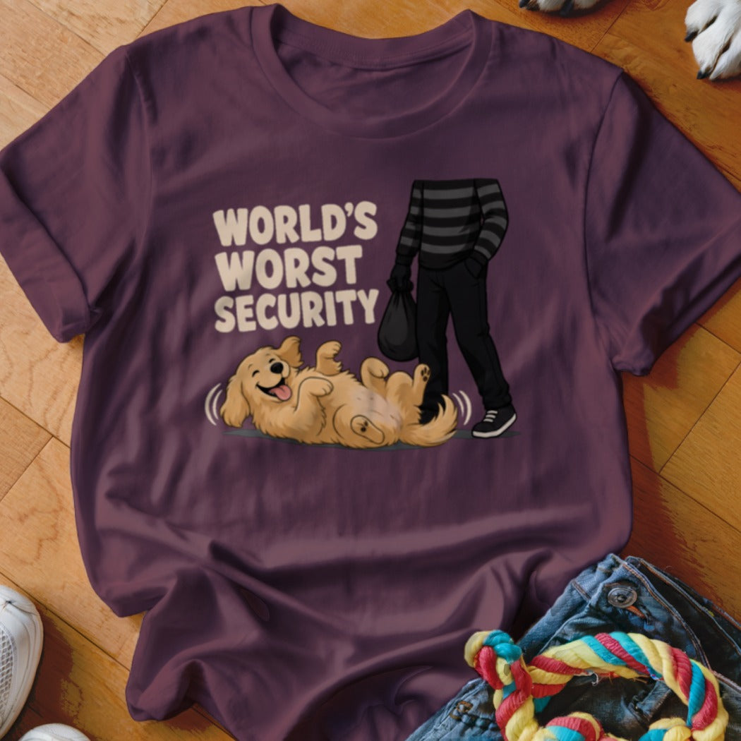 Plum t-shirt featuring text reading World's Worst Security and a graphic of a burglar ignoring a happy golden retriever rolling on its back.