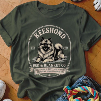 Keeshond Bed & Blanket Co. logo with dog illustration and text.