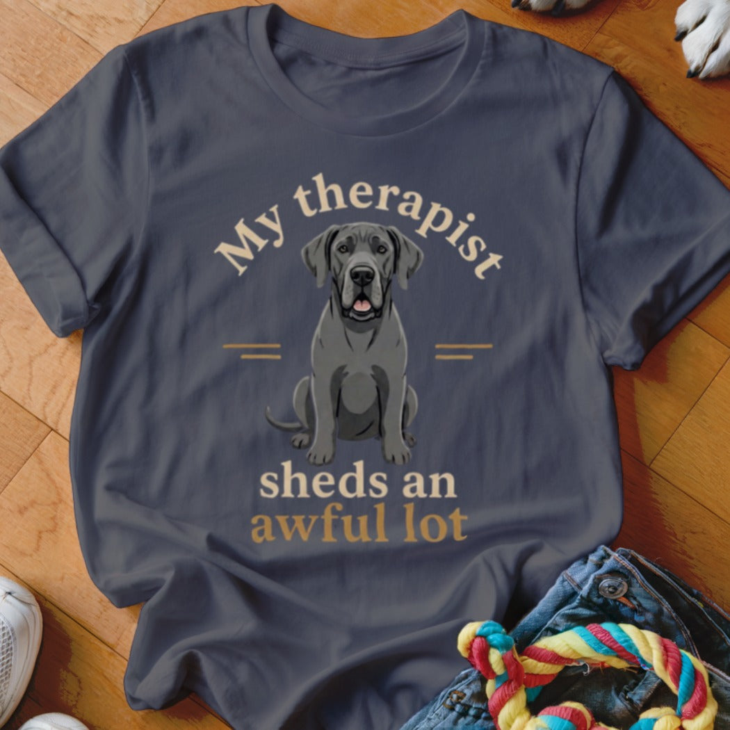 Dark grey t-shirt with a sitting grey Great Dane and text: "My therapist sheds an awful lot".