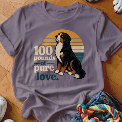 Bernese Mountain Dog sits with text "100 pounds of pure love."