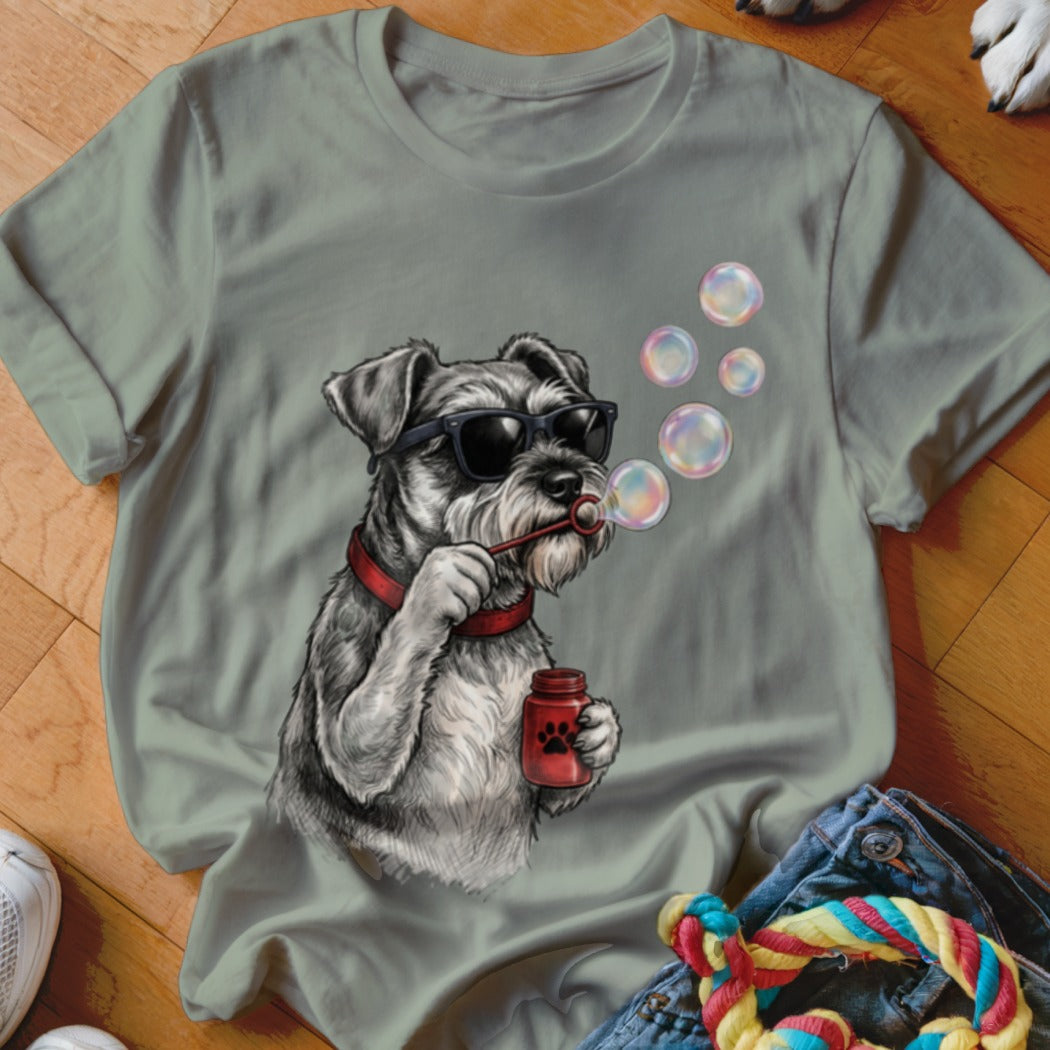 Olive green crewneck t-shirt featuring a graphic of a schnauzer dog wearing sunglasses while blowing bubbles.