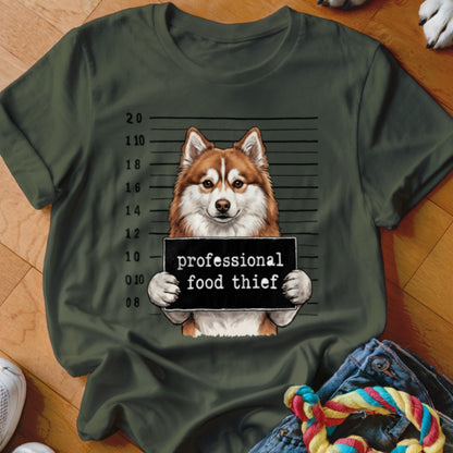 Husky dog holding "professional food thief" sign with height markings.