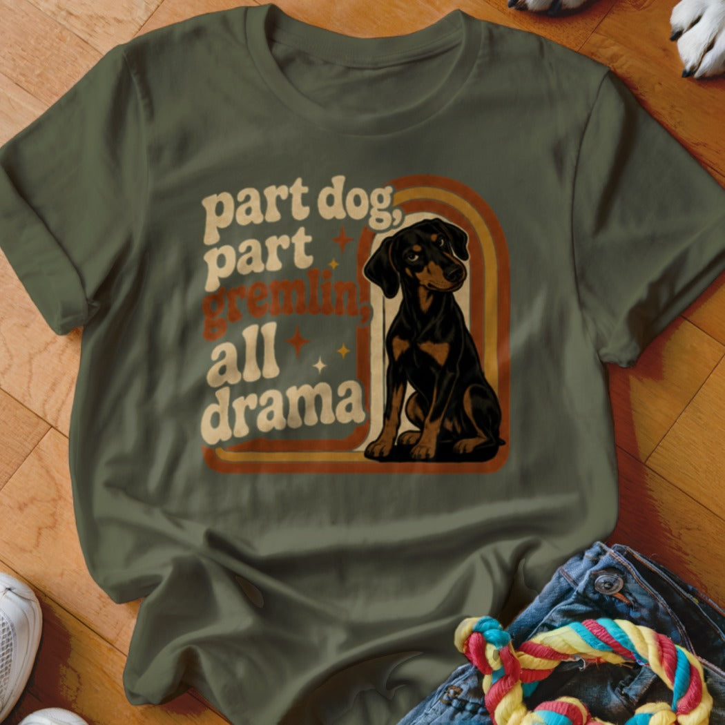 Green t-shirt with "part dog, part gremlin, all drama" text and a dog illustration.