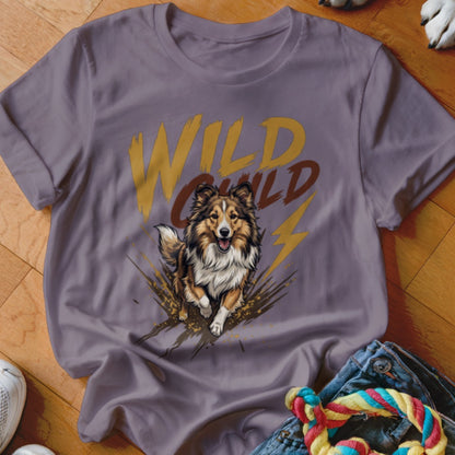 A purple t-shirt with a graphic of a running dog and the text Wild Child.