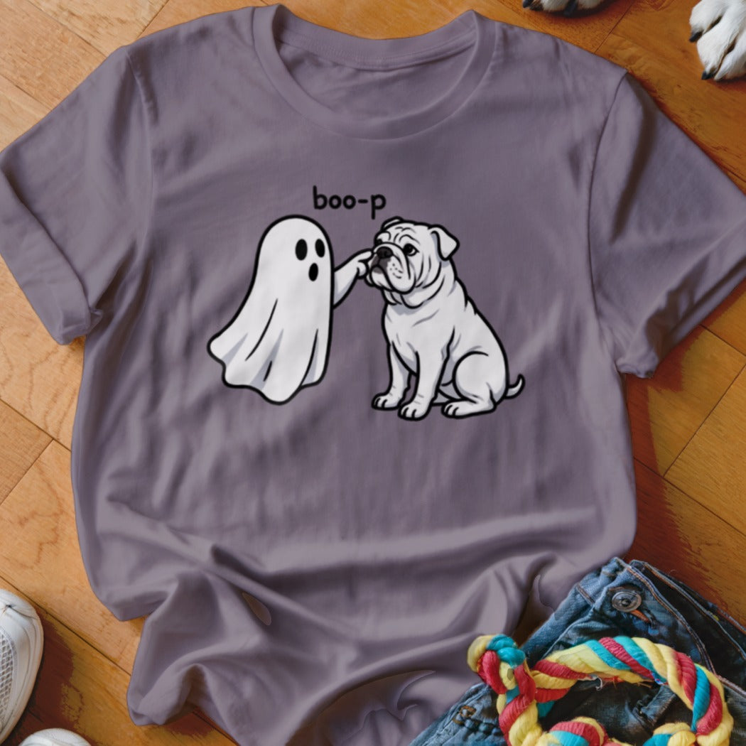 Ghost boo-p-ing a white bulldog on a purple t-shirt.