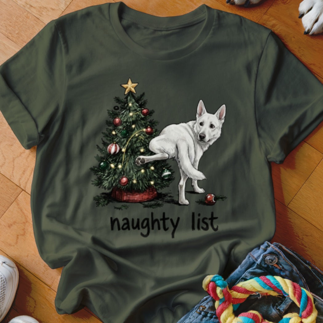 White German Shepherd next to a Christmas tree with "naughty list" text.