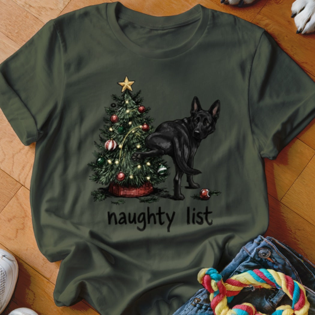 German Shepherd by Christmas tree with "naughty list" text.