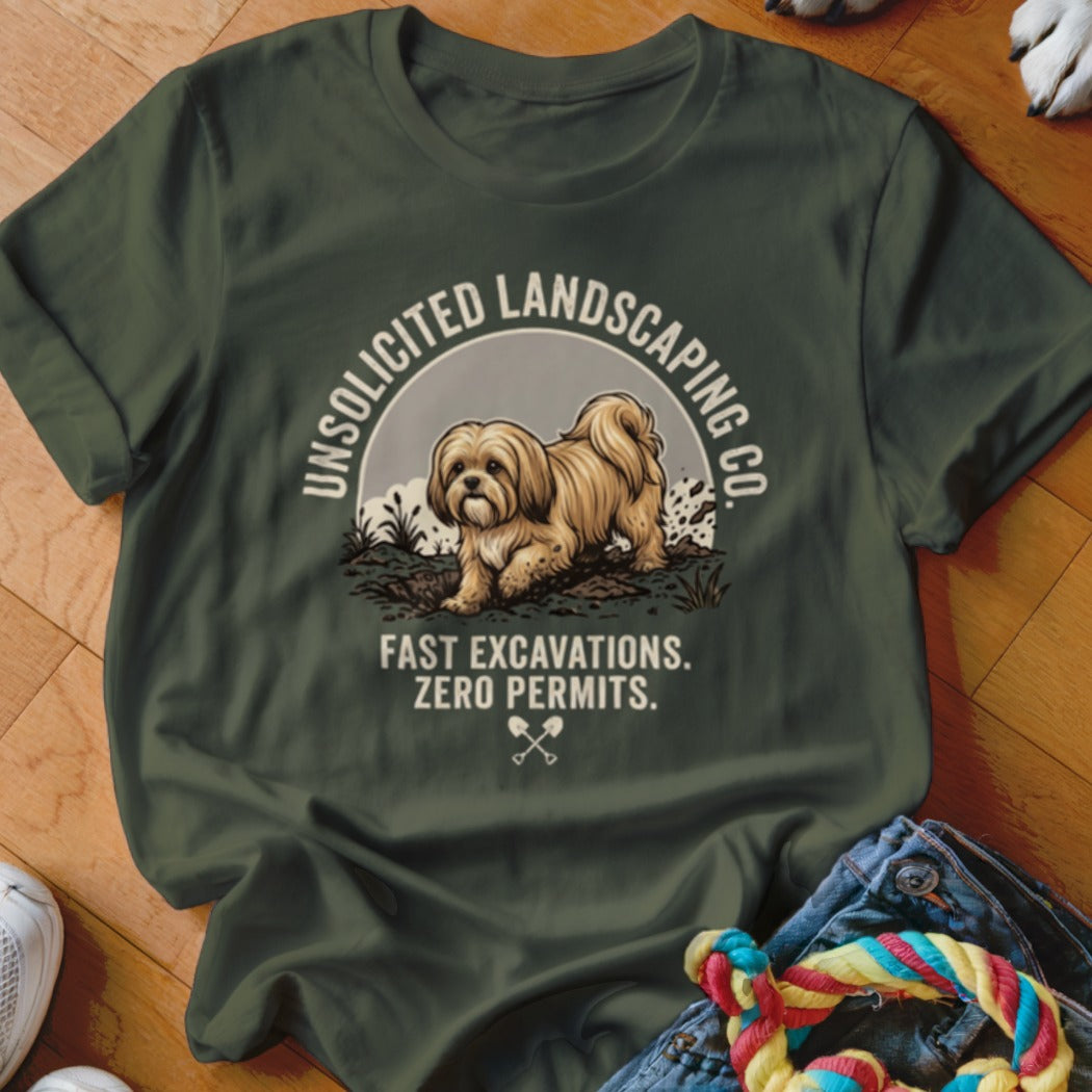T-shirt with a dog graphic and text "Unsolicited Landscaping Co." and "Fast Excavations. Zero Permits."