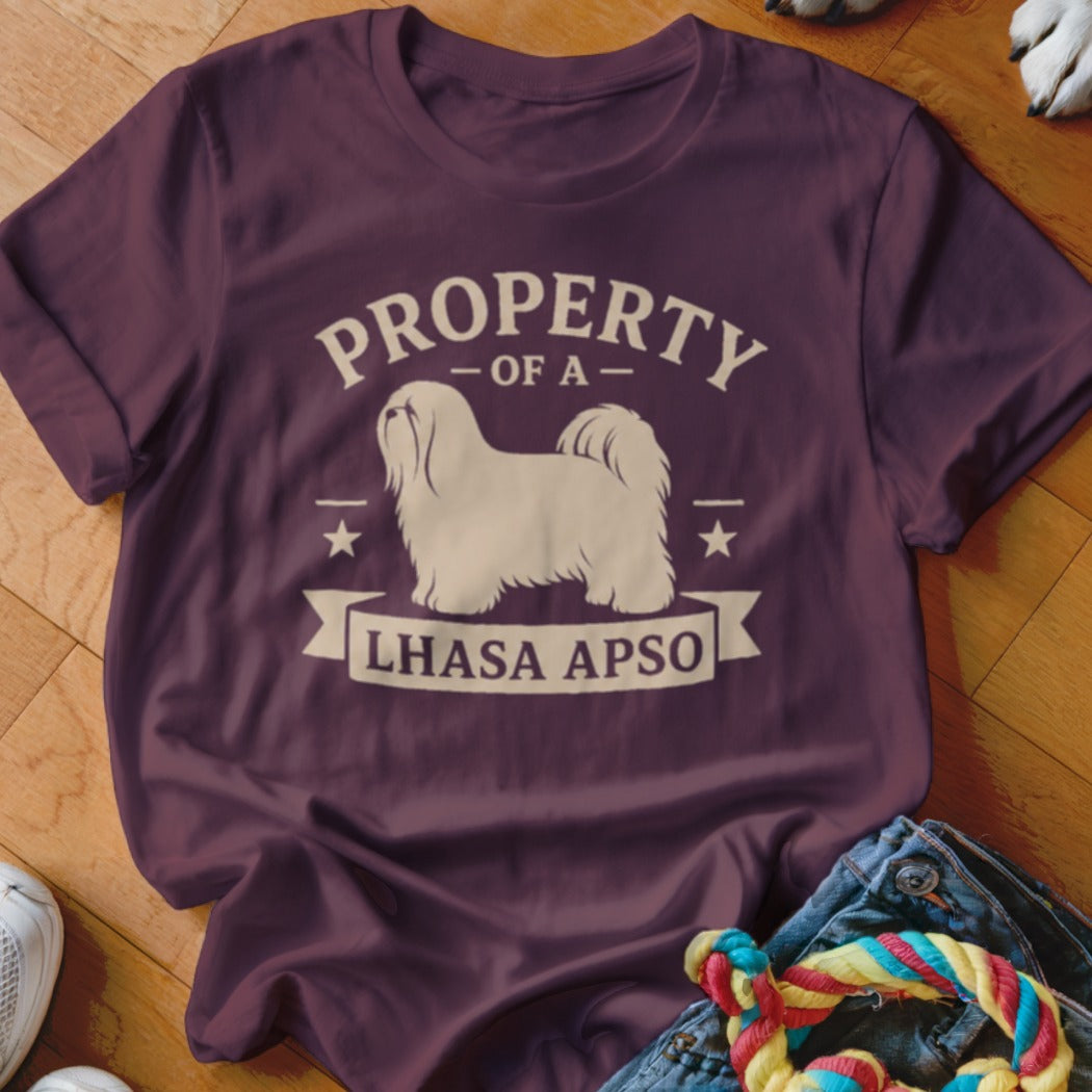 Maroon t-shirt with "PROPERTY OF A LHASA APSO" text and Lhasa Apso dog graphic.