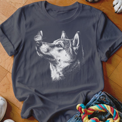 Dark gray t-shirt featuring a white graphic of a husky looking up at a butterfly.