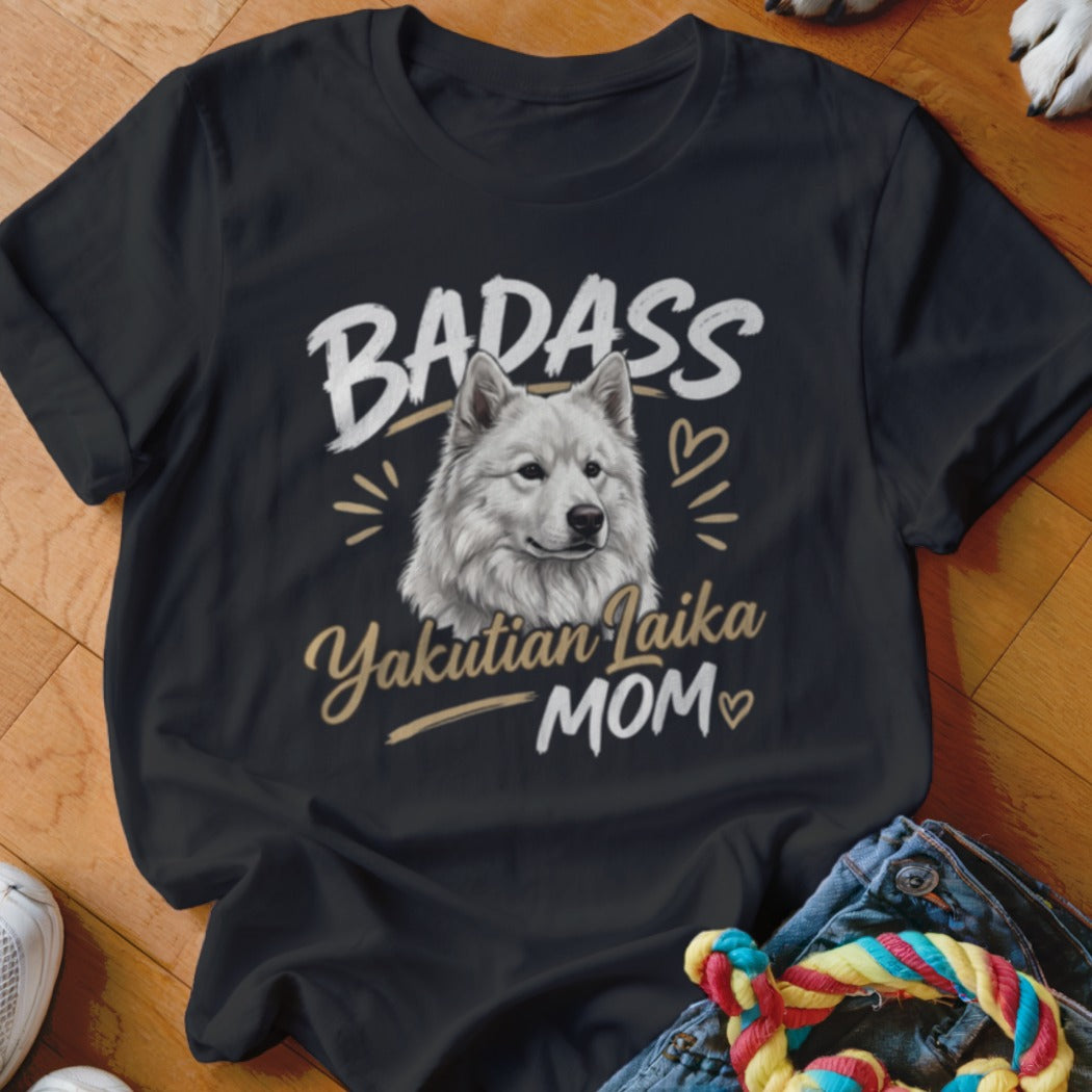 A black crewneck t-shirt featuring a graphic of a white dog and the text "BADASS Yakutian Laika MOM".